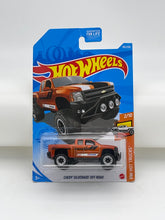 Load image into Gallery viewer, Hot Wheels Chevy Silverado Off Road (Orange)
